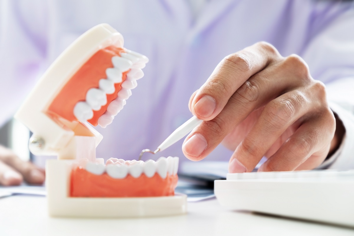 What is the Difference Between Teeth Restoration and Teeth Filling