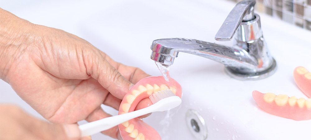 clean dentures