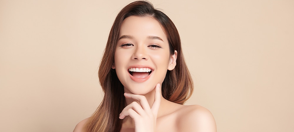 happy girl after dental bridge