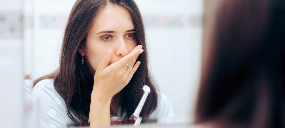 girl suffering from gum disease