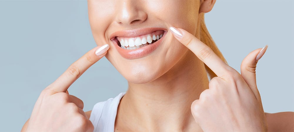 girl showing teeth whitening