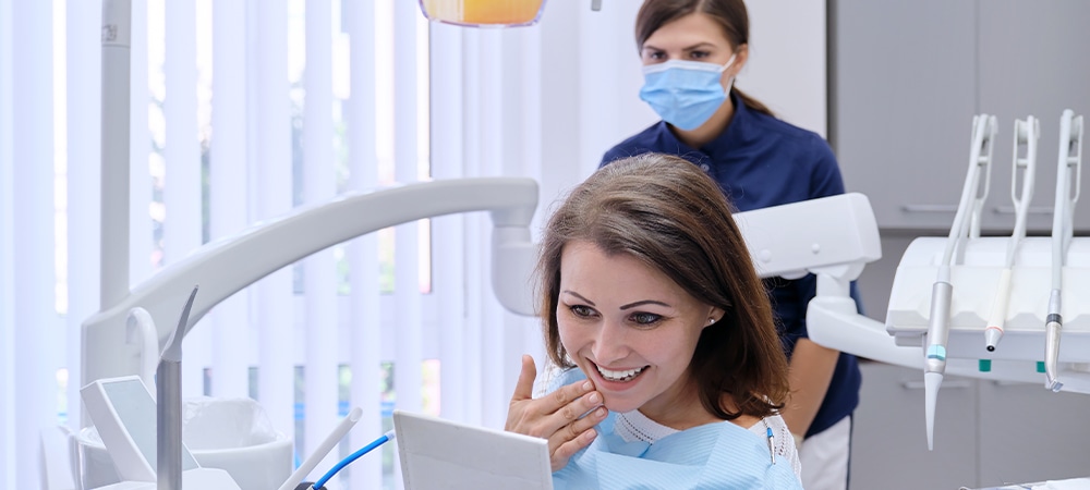 happy client after dental implantation