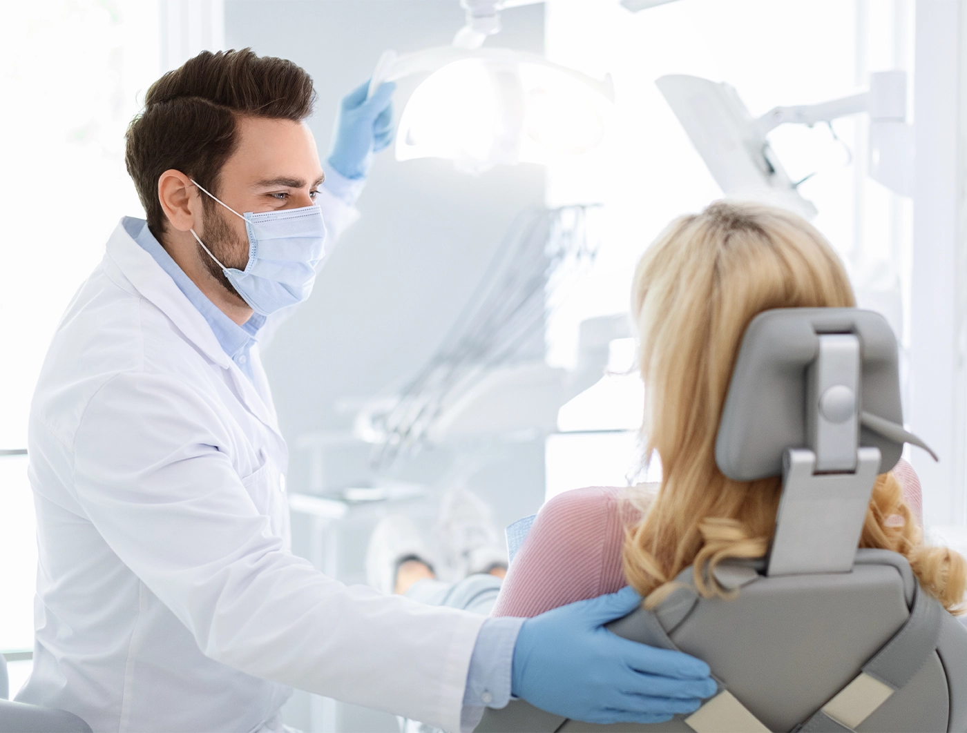 dentist and patient in clinic